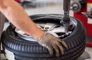 person holding black and gray metal tool