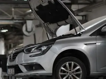 A car being worked on in a car repair shop